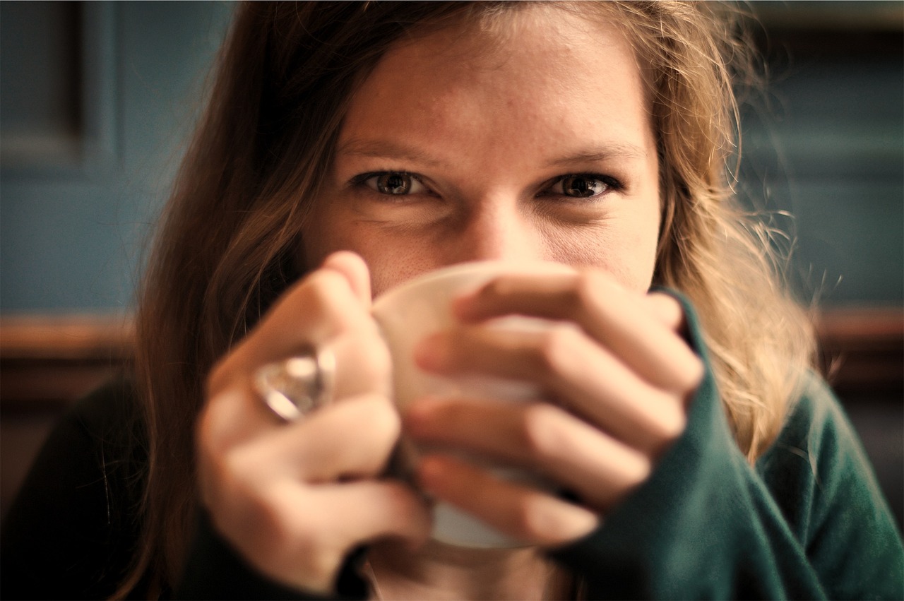 girl, woman, smile, coffee cup, smiling, happy, coffee, tea, cup, drinking, eyes, people, tea cup, cozy, comfortable, relaxed, sipping, brown coffee, brown happy, brown relax, brown tea, brown smile, brown eye, brown happiness, brown cup